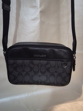 Coach Graham Crossbody bag in Charcoal Black signature coated canvas.